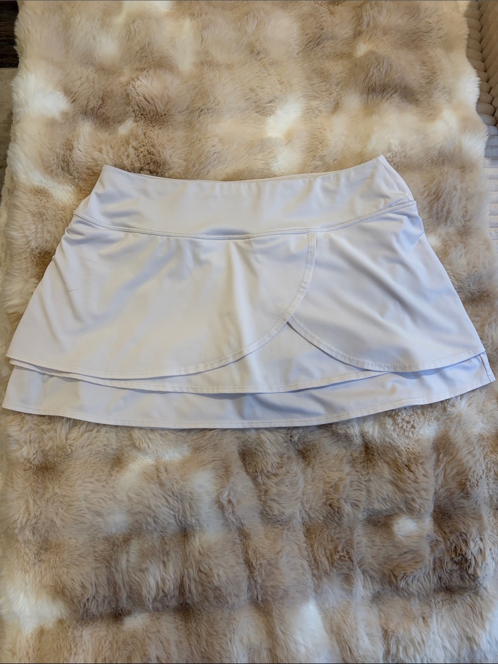 Athleta skort in white with shorts back pocket with zipper size medium